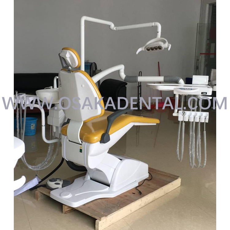 Sillón dental con taburete dental con cuero color naranja