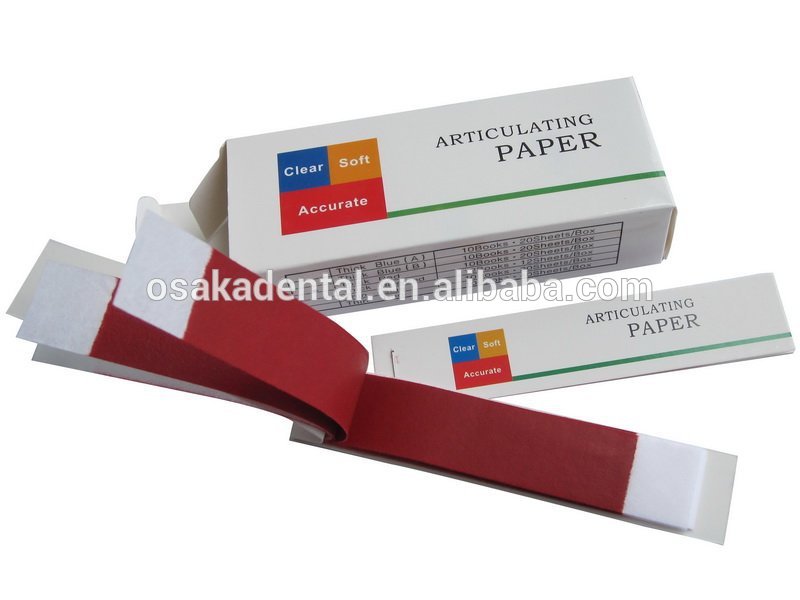 Un papel articulado dental rojo y azul grueso y fino