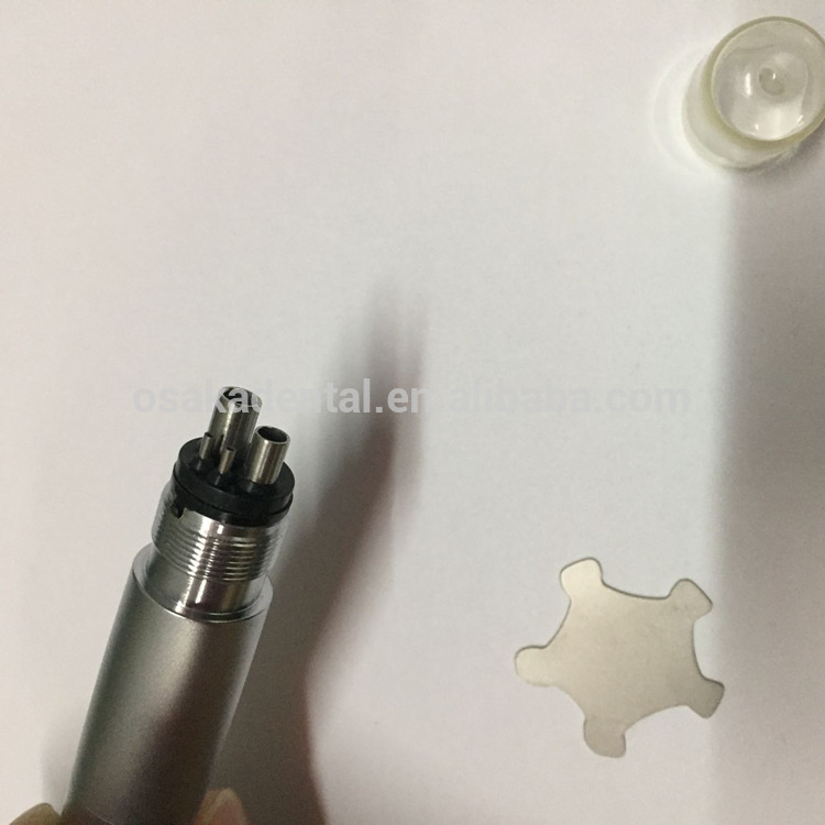 Una pieza de mano dental LED con botón pulsador con triple rociador de agua