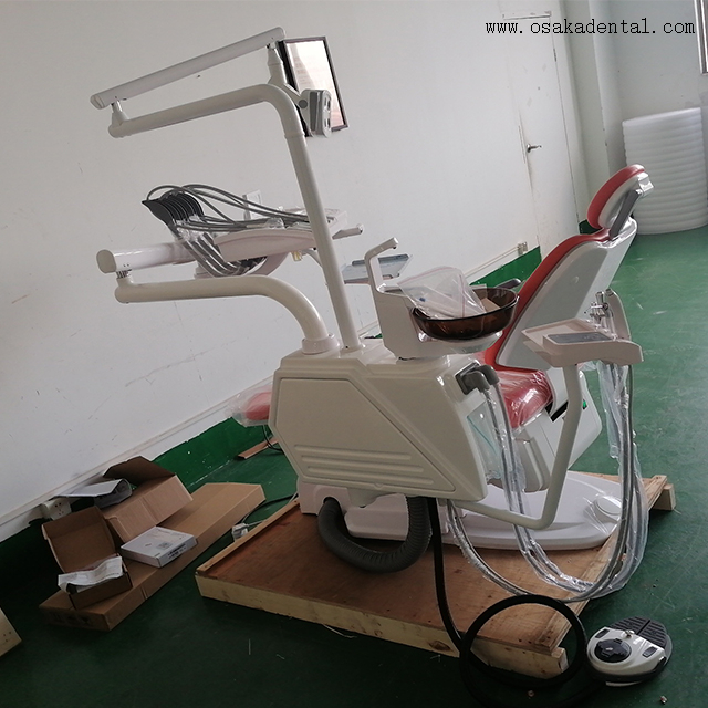 Sillón dental de lujo con bandeja para instrumentos montada en la parte superior 