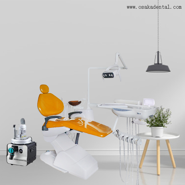 Sillón dental con máquina de succión