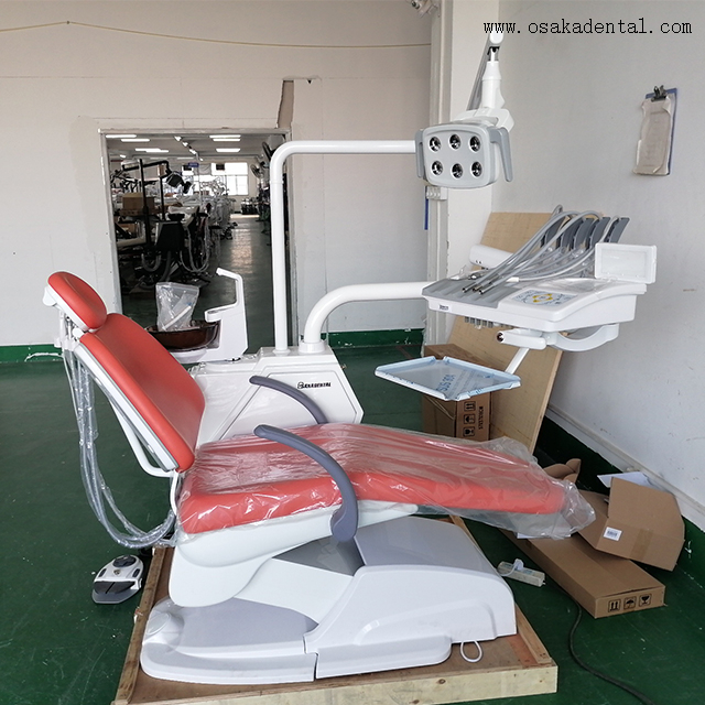 Sillón dental de lujo con bandeja para instrumentos montada en la parte superior 
