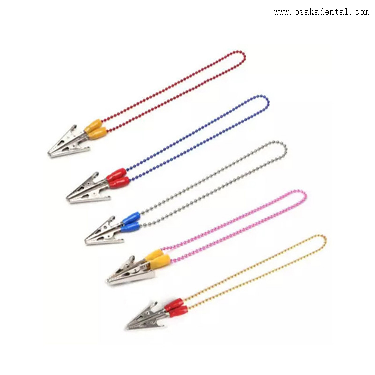 Porta babero dental desechable con clip metálico