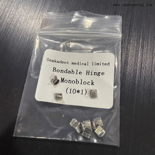 Monobloque de bisagra adherible de ortodoncia dental