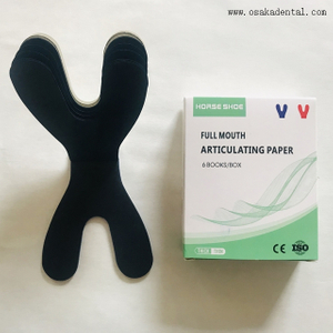 Nueva boca completa articulando papel azul y rojo.