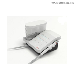 Escalador dental ultrasónico popular de los dientes con el limpiador ultrasónico de la botella de agua