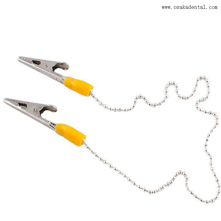 Porta babero dental desechable con clip metálico