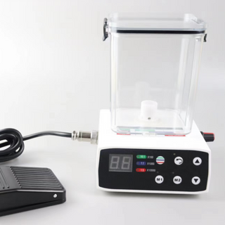 Motor eléctrico dental con tanque de agua y pedal.