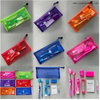 Kit de ortodoncia dental colorido con bolsa de malla