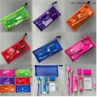 Kit de ortodoncia dental colorido con bolsa de malla
