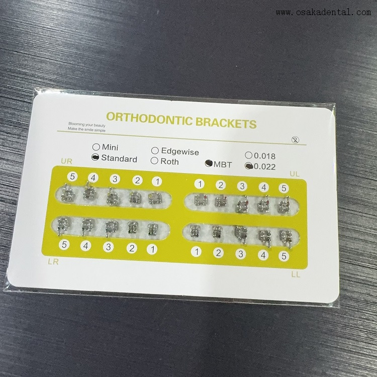 Soporte de metal adherible monobloque de ortodoncia dental