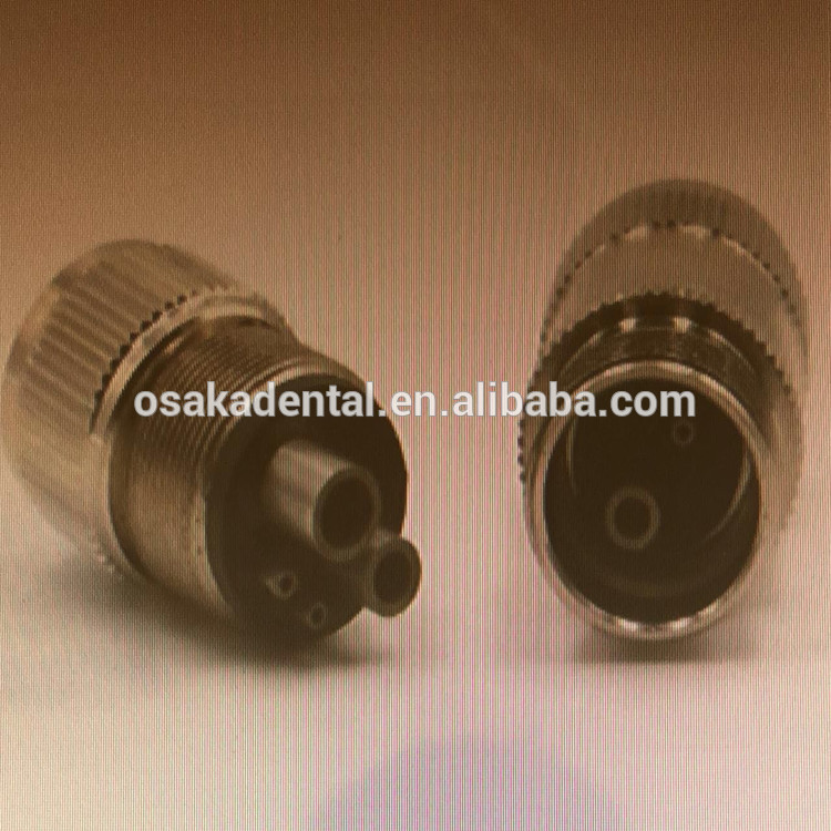 Un adaptador de pieza de mano dental de 4 agujeros a 2 agujeros