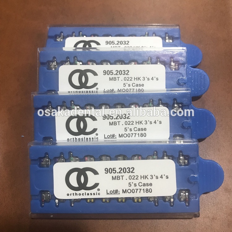 Soportes de ortodoncia dental ROTH / MBT / Edgwise con caja azul OC