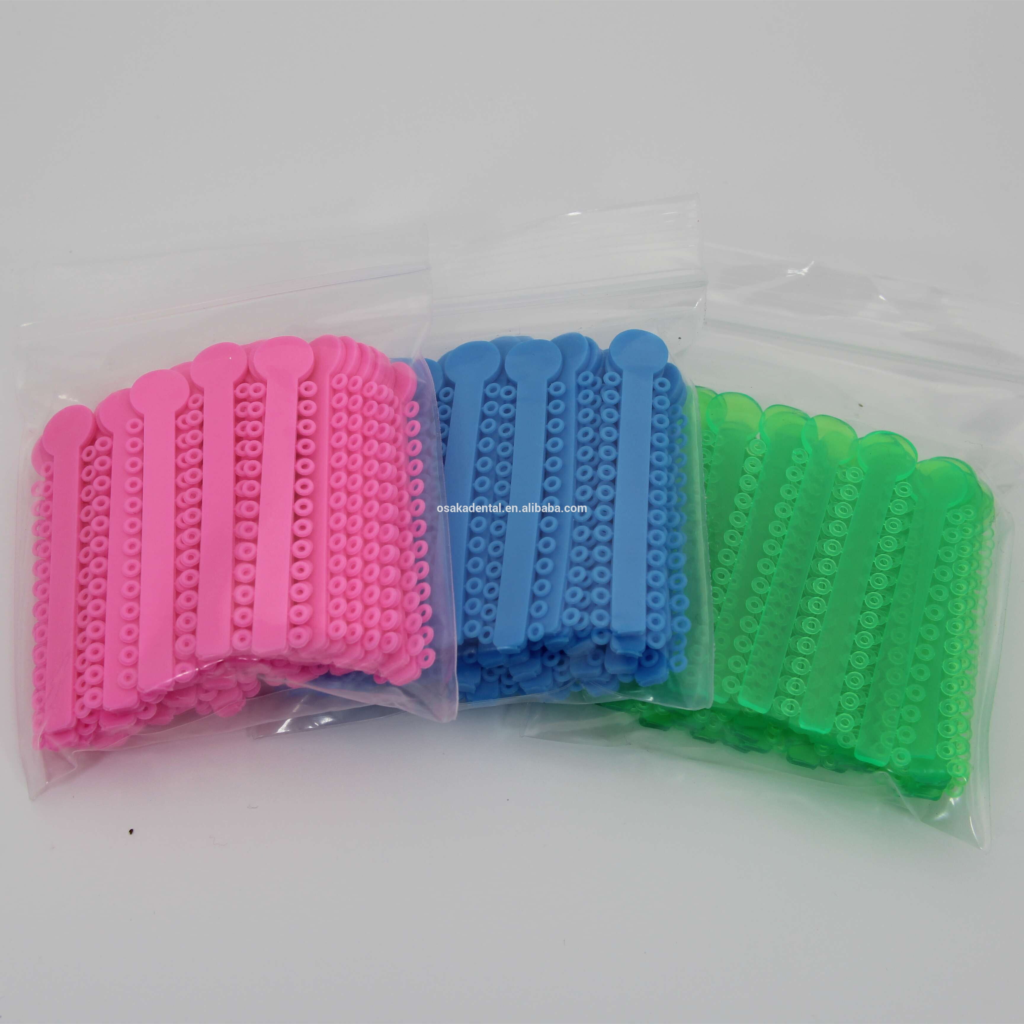 Lazo barato de la ligadura de la ortodoncia dental con 42 colores