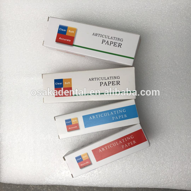 Un papel articulado dental rojo y azul grueso y fino